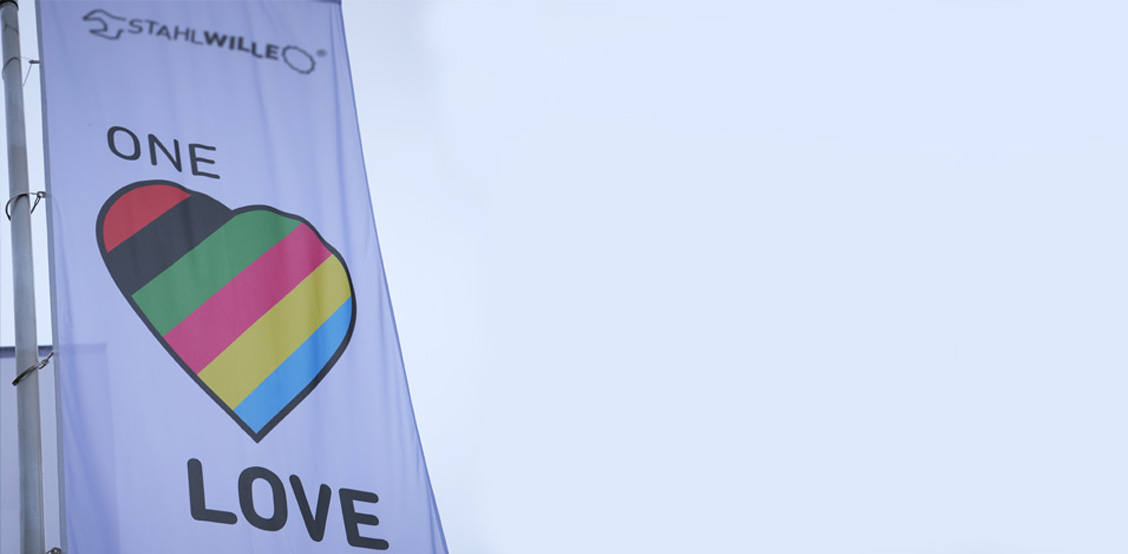 One Love flag in front of STAHLWILLE branch office